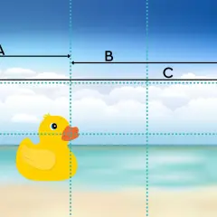 Een badeend op het strand, met lijnen die de gulden snede verhouding illustreren.