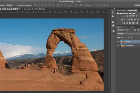 Bewerken van foto's in Photoshop. Delicate Arch in Arches National Park, met aanpassingslagen en lagenpanelen zichtbaar.