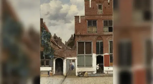 Het straatje van Vermeer toont een rustige Delftse straat met bakstenen huizen, vrouwen bij de deuropening en een hondje.
