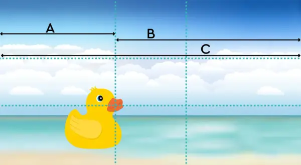 Een badeend op het strand, met lijnen die de gulden snede verhouding illustreren.
