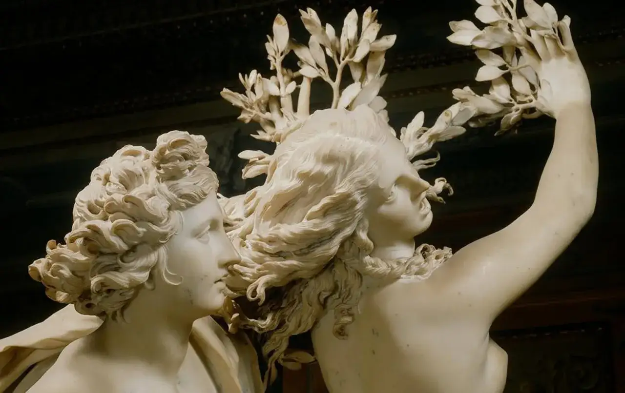 Apollo en Daphne van Bernini: Daphne verandert in een laurierboom terwijl Apollo haar probeert te grijpen.
