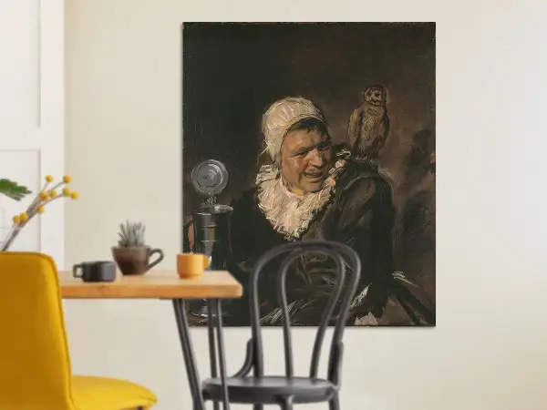 Een schilderij van een "malle babbe" met een uil op haar schouder. Ze draagt een witte kap en een ruime kraag.